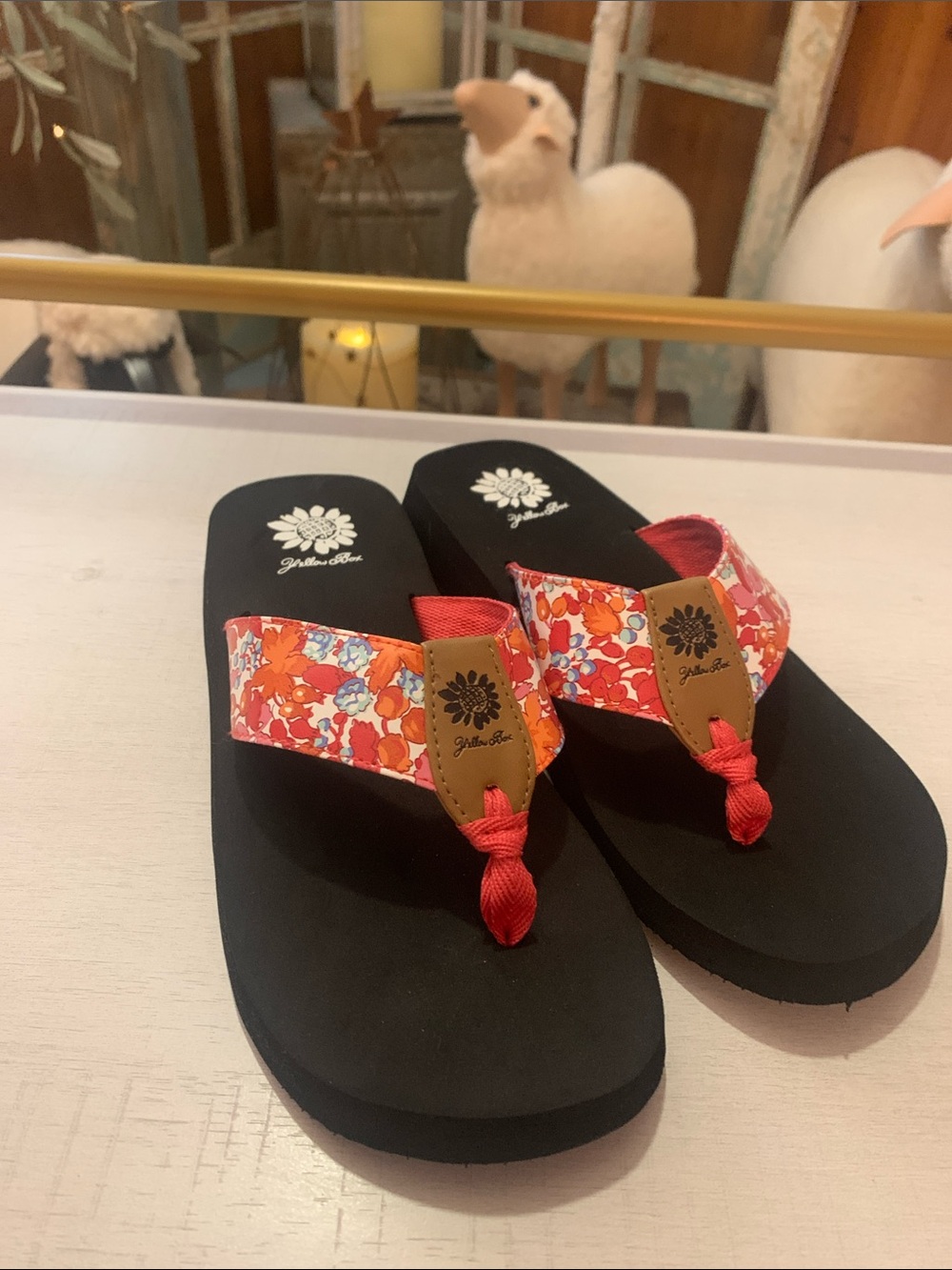 Yellow Box Black Flip Flops with Red-Orange Floral Straps